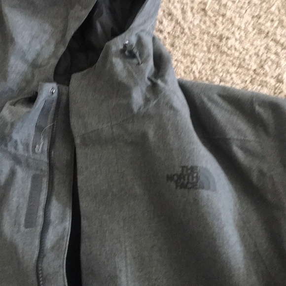 Men’s grey North Face rain jacket